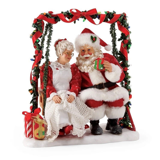 DEPARTMENT 56 POSSIBLE DREAMS SANTA AND MRS CLAUS ON SWING GARDEN RETREAT 28CM