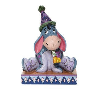 DISNEY TRADITIONS BY JIM SHORE EEYORE WITH BIRTHDAY HAT
