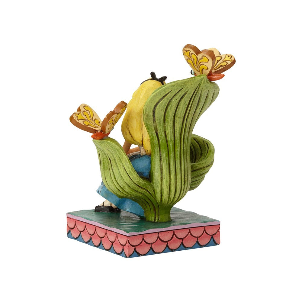 DISNEY TRADITIONS BY JIM SHORE ALICE ON GREEN CHAIR CURIOUSER AND CURIOUSER